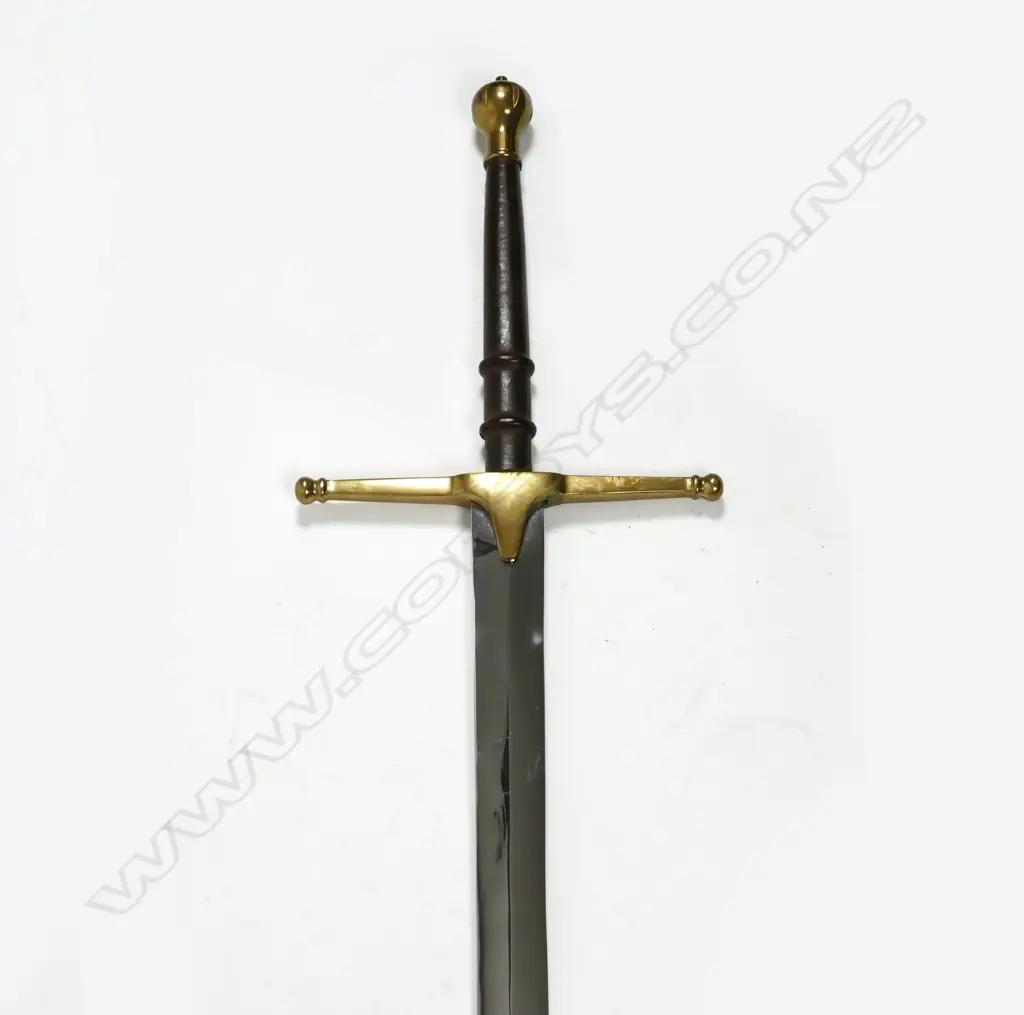 A replica of a double handled Scottish broad sword Image 1++