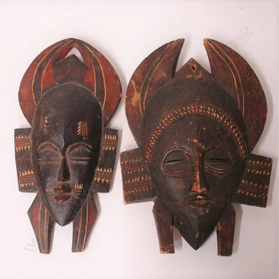 Two West African carved wooden tribal masks