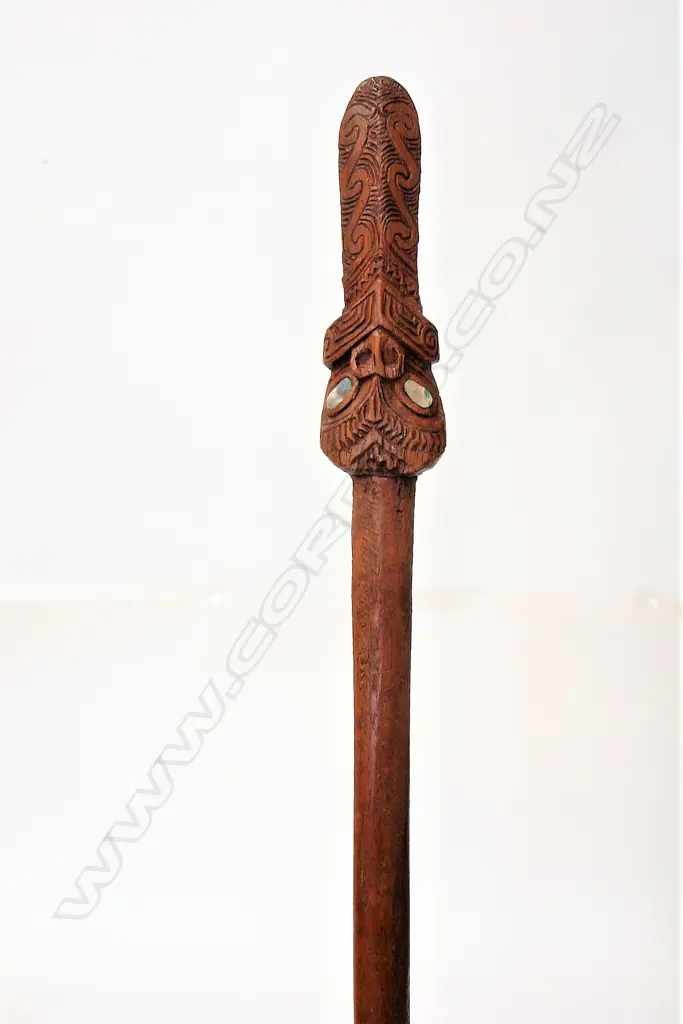 An old Maori carved wooden taiaha Image 1++