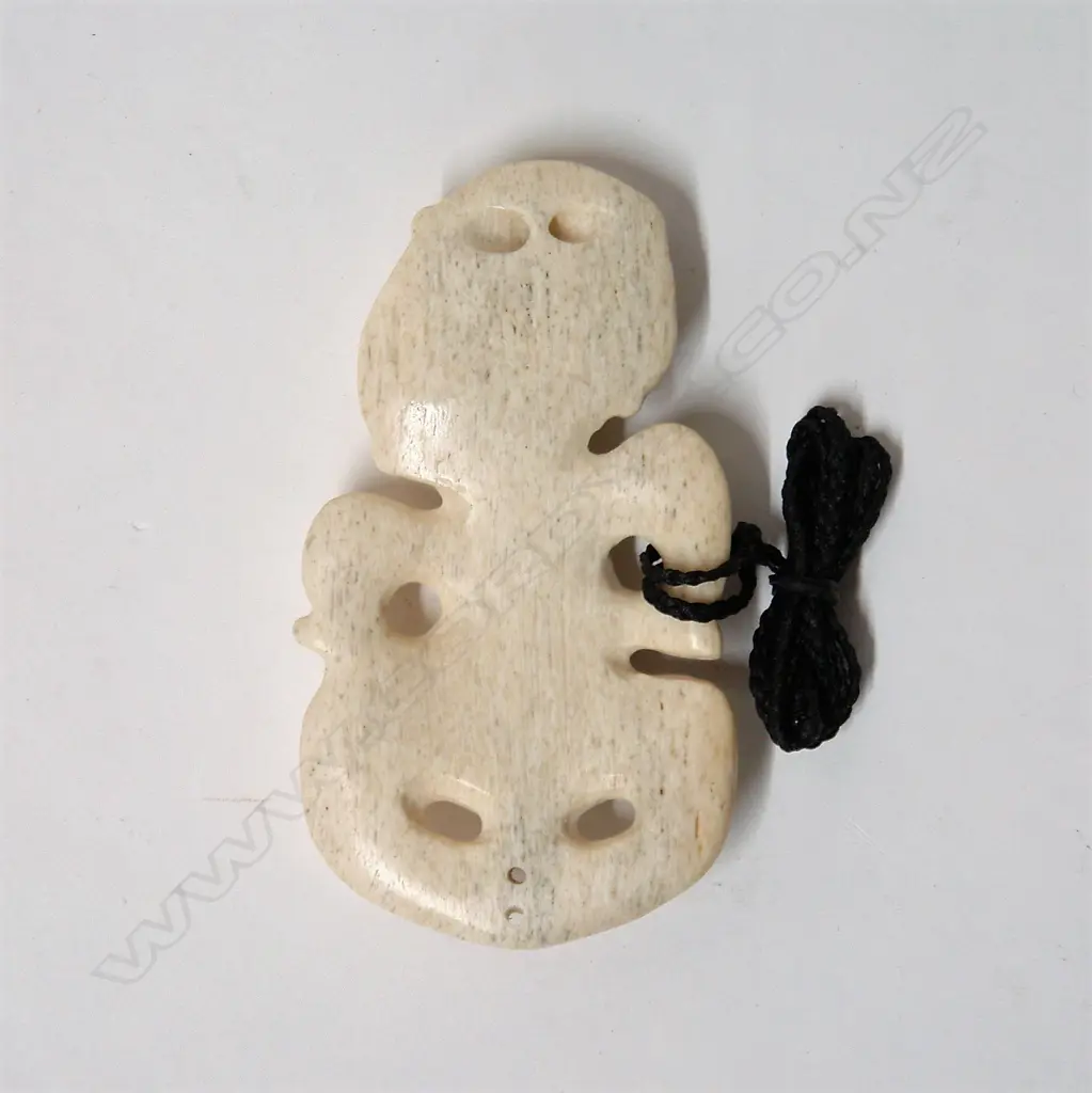 A Raponi Wilson carved whalebone (Paraoa) hei tiki Image 1++