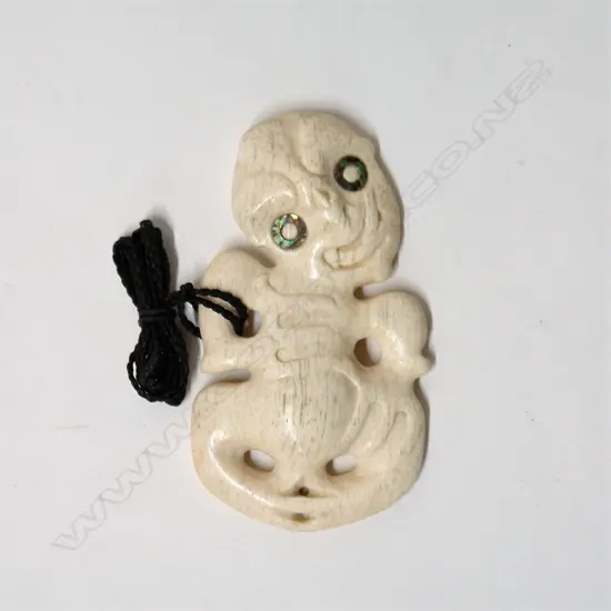 A Raponi Wilson carved whalebone (Paraoa) hei tiki