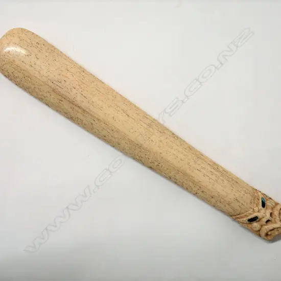 A modern solid whalebone hand club