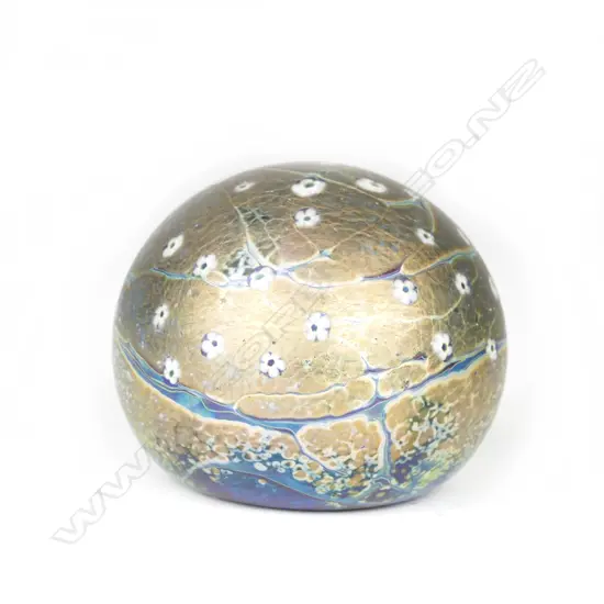 An Okra glass paperweight