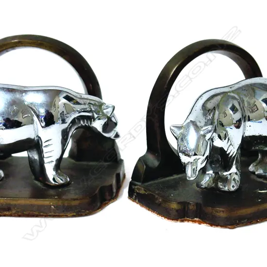 A pair of Art Deco bronze and chromed polar bear bookends