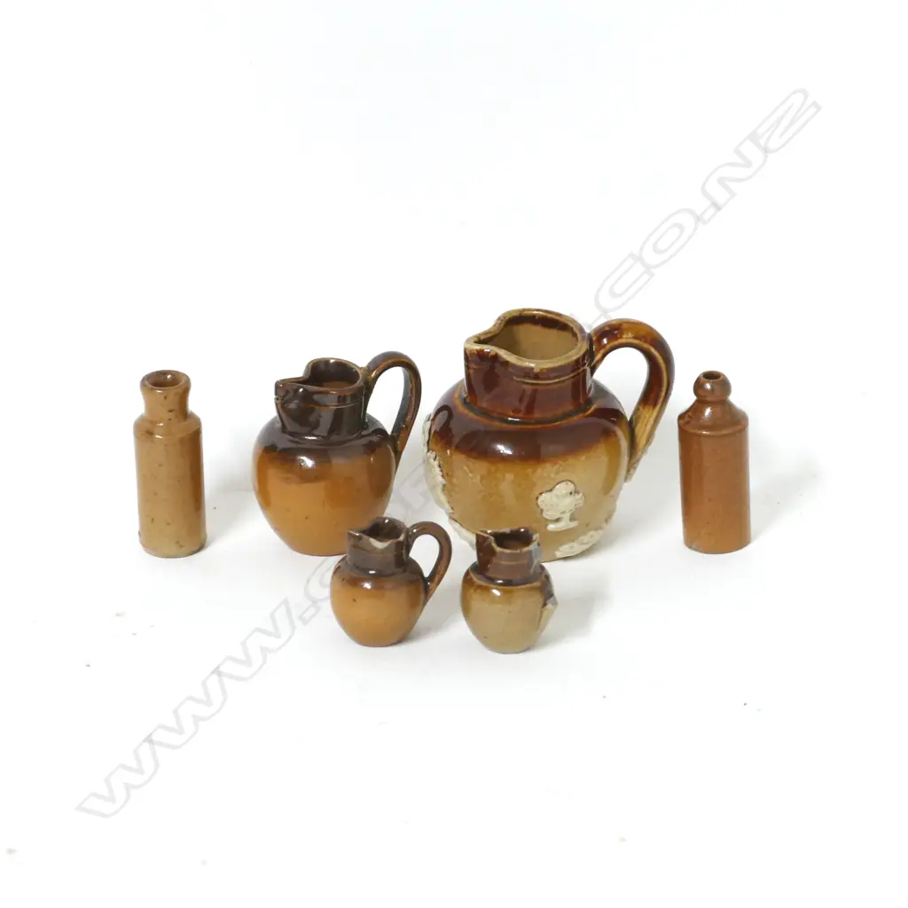 Three miniature salt glazed jugs Image 1++