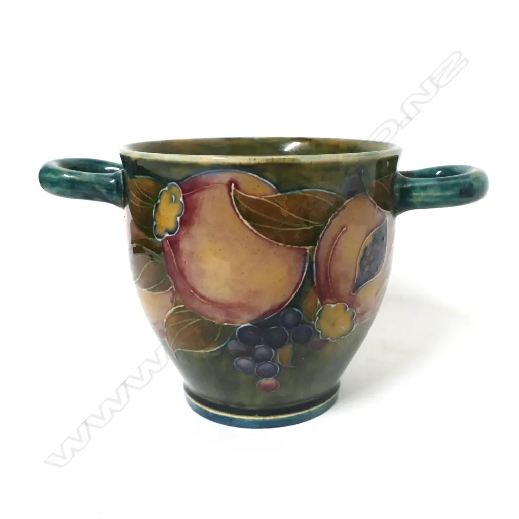 A small William Moorcroft pomegranate two-handled vase Image 1++