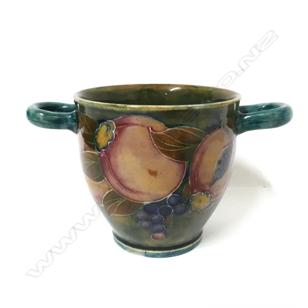 A small William Moorcroft pomegranate two-handled vase Image 1++