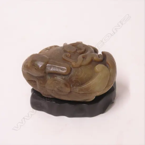 A Chinese carved jade lidded duck form vessel in an ancient style