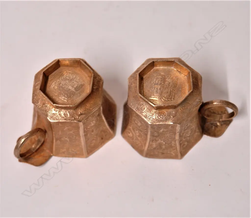 A pair of fine and old Chinese silver gilt Tang style cups Image 1++