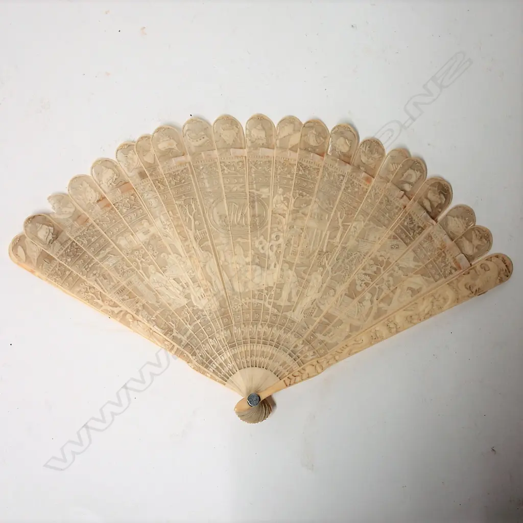 A 19thC Chinese finely carved ivory fan Image 1++