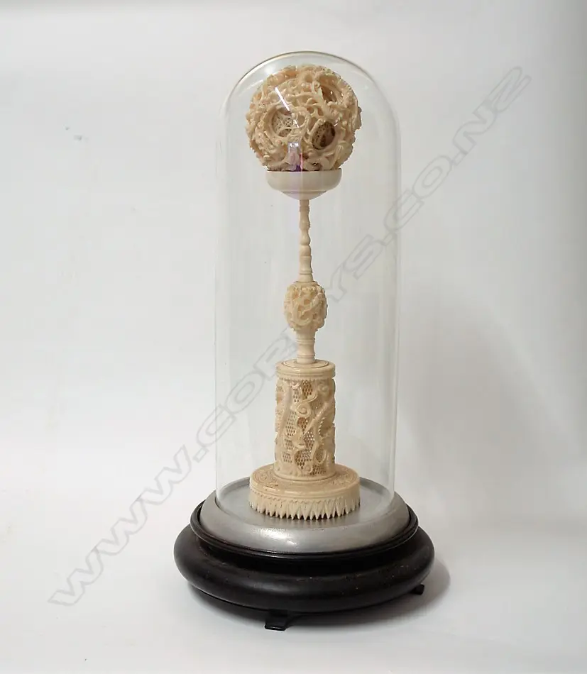 An old large Chinese carved ivory puzzle ball on stand Image 1++