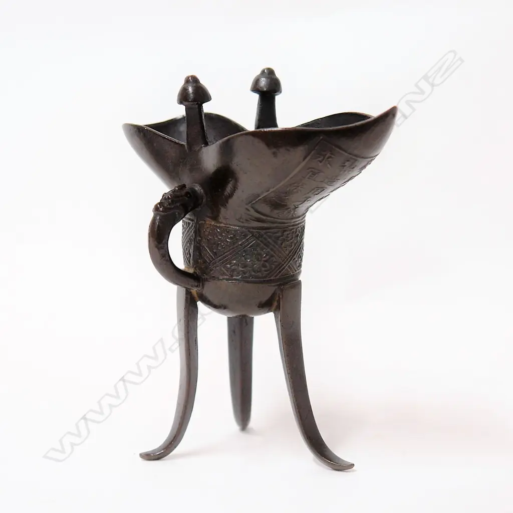 A fine old Chinese bronze jue cup Image 1++