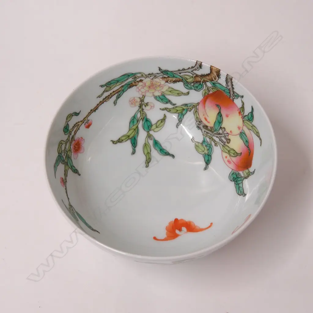 A finely hand enamelled Chinese ‘bat and peaches’ bowl Image 1++