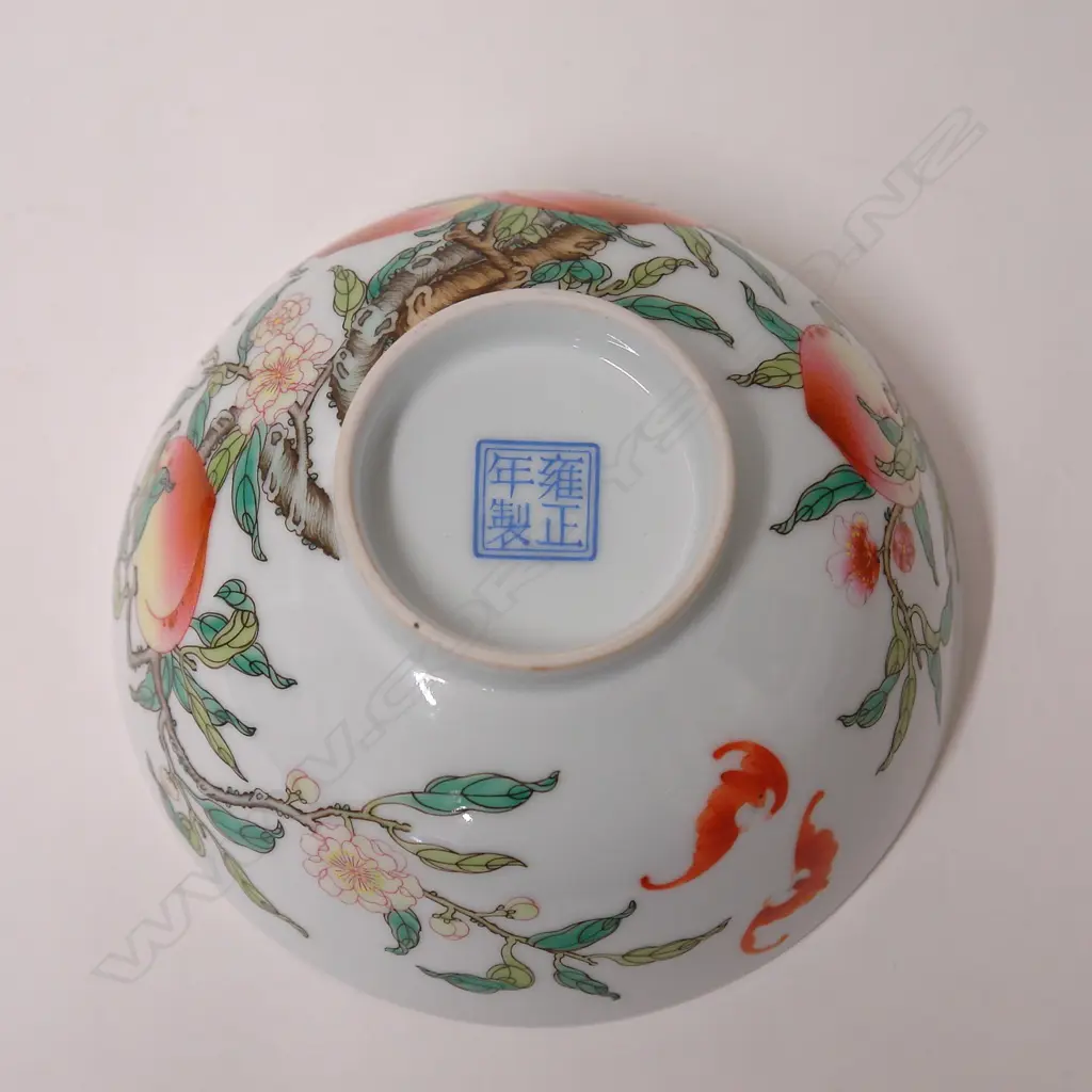 A finely hand enamelled Chinese ‘bat and peaches’ bowl Image 1++