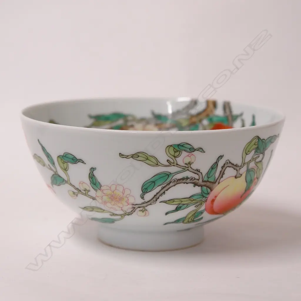 A finely hand enamelled Chinese ‘bat and peaches’ bowl Image 1++