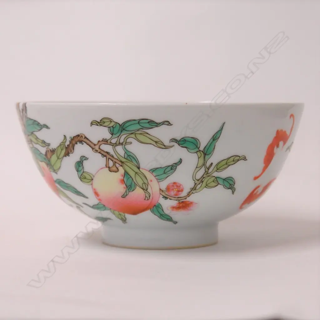 A finely hand enamelled Chinese ‘bat and peaches’ bowl Image 1++
