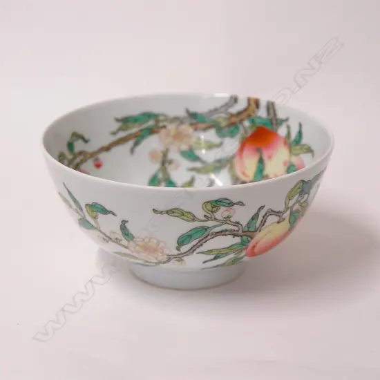 A finely hand enamelled Chinese ‘bat and peaches’ bowl