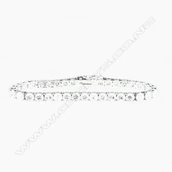 A 14ct. white gold diamond tennis bracelet
