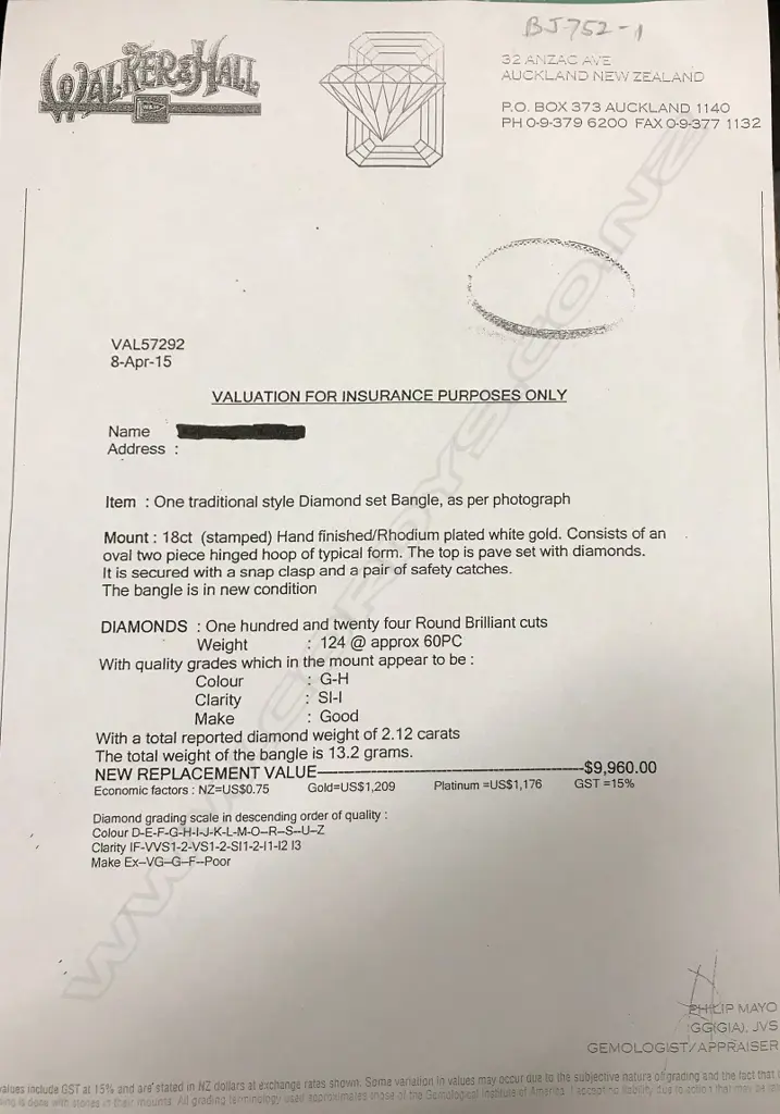 A lady's modern 18ct. white gold and diamond set traditional style bangle Image 1++