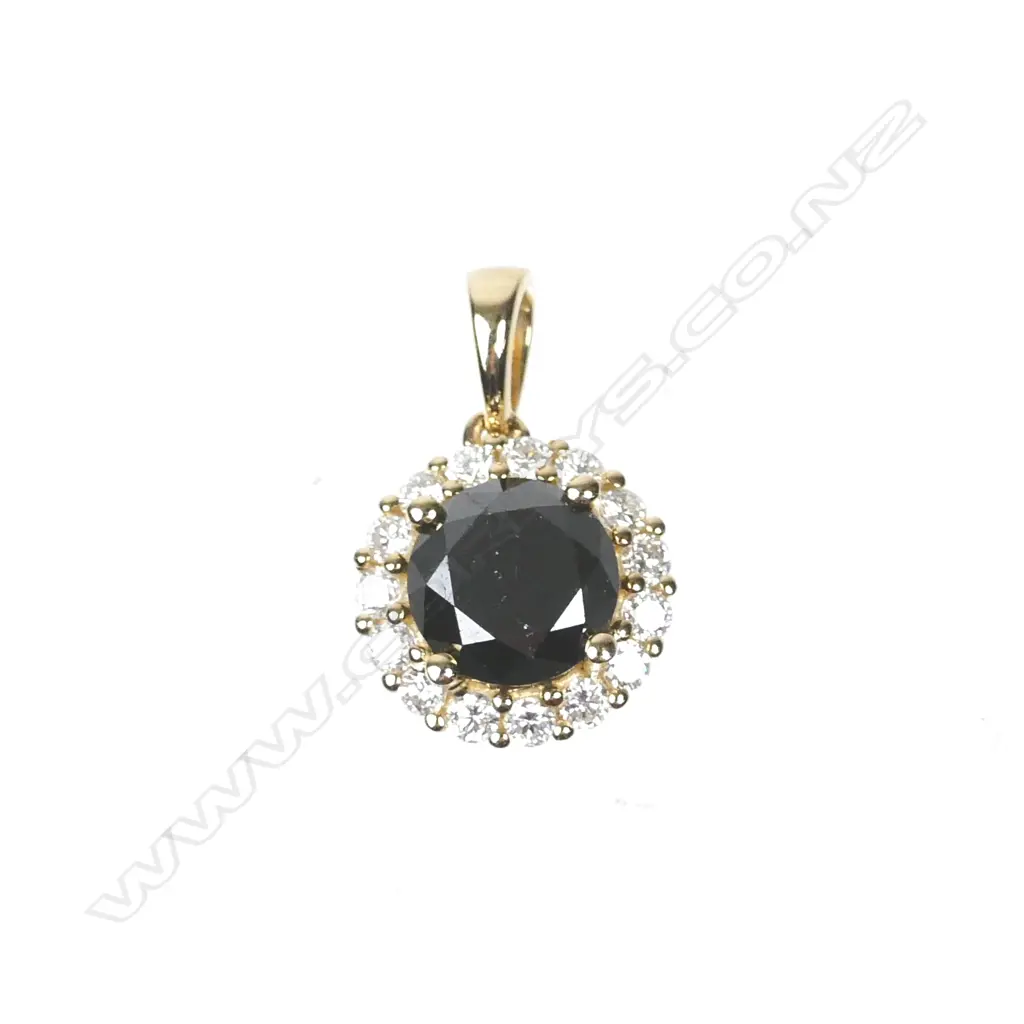 A 14ct. gold and diamond pendant Image 1++