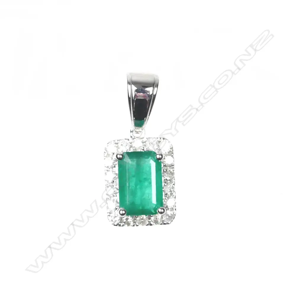 A 14ct. white gold emerald and diamond pendant Image 1++