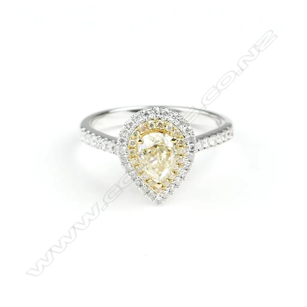 An 18ct. white gold and diamond combination pendant/ring Image 1++