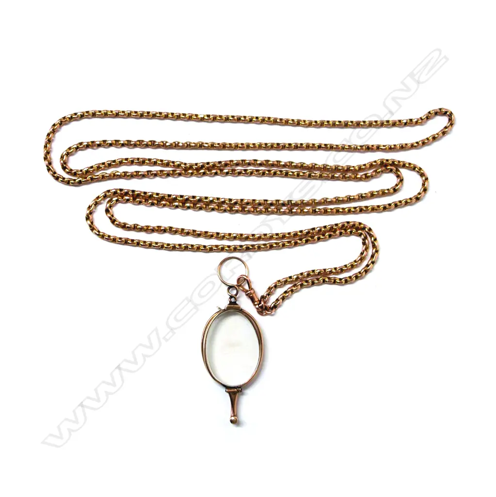 A late 19thC 9ct. rose gold muff chain with a vintage 9ct. rose gold lorgnette Image 1++