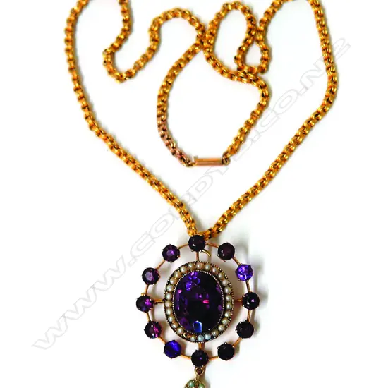 An early 20thC 9ct. amethyst and seed pearl pendant on chain