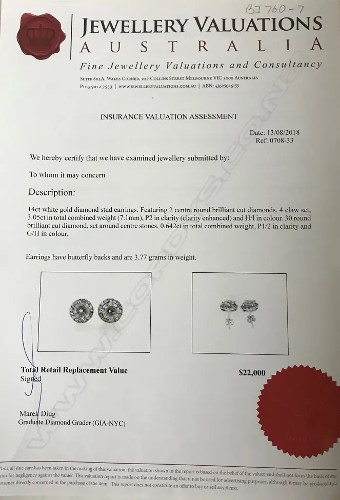 A pair of 14ct. white gold and diamond stud earrings Image 1++