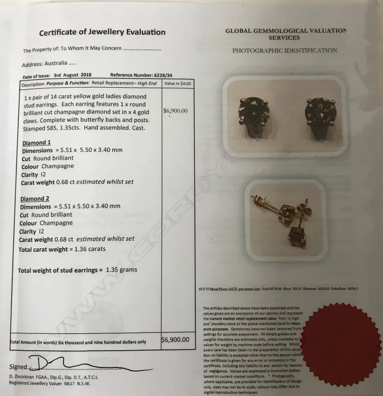 A pair of 14ct. gold and diamond stud earrings Image 1++