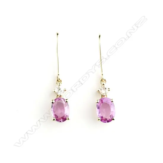 A pair of 14ct. gold sapphire and diamond earrings