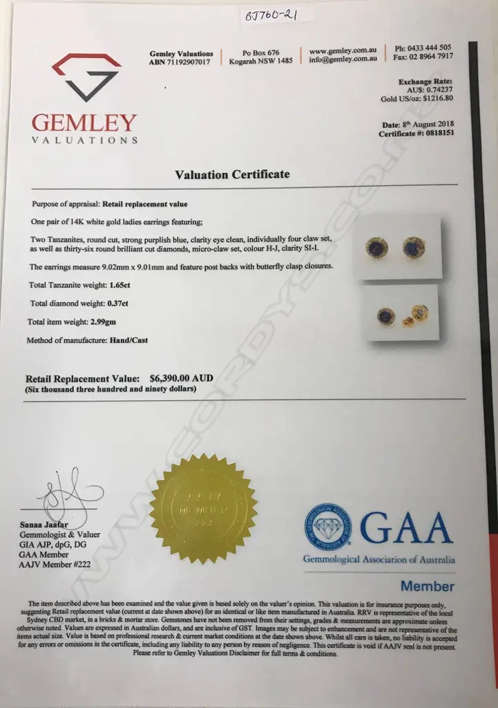 A pair of 14ct. gold tanzanite and diamond stud earrings Image 1++