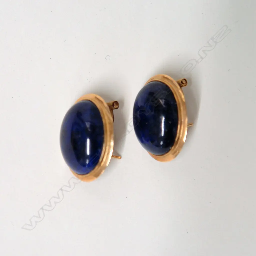 A pair of 14ct. yellow gold and deep blue stone earrings Image 1++