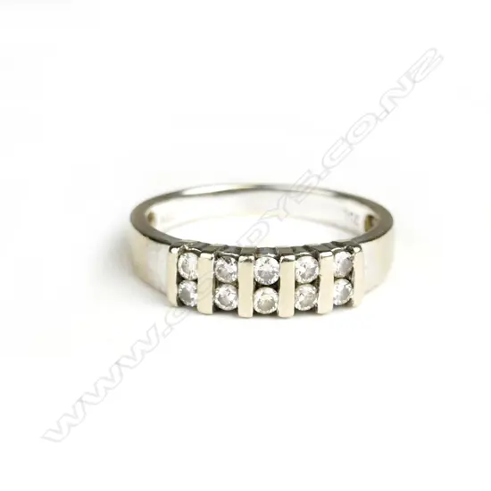 A vintage 18ct. gold Rhodium plated ten diamond dress ring