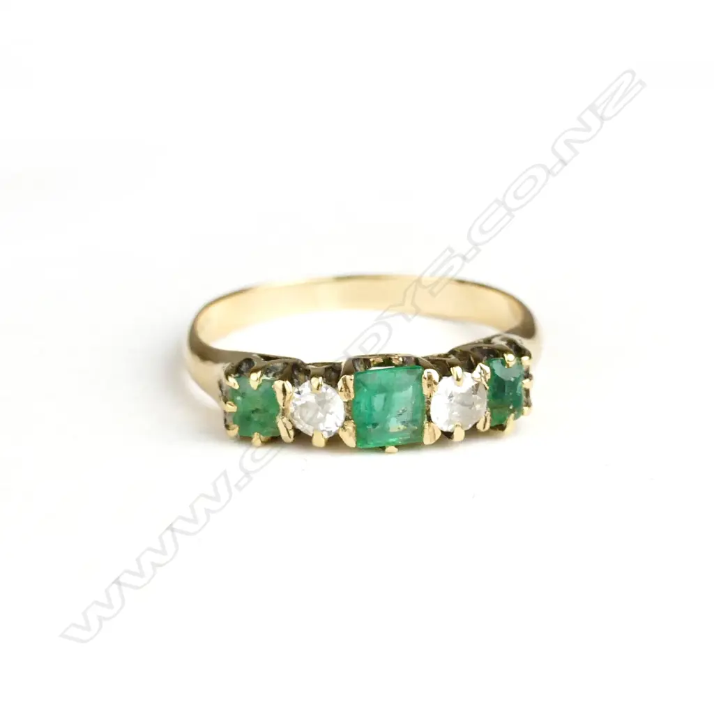An estate 18ct. yellow gold emerald and diamond dress ring Image 1++