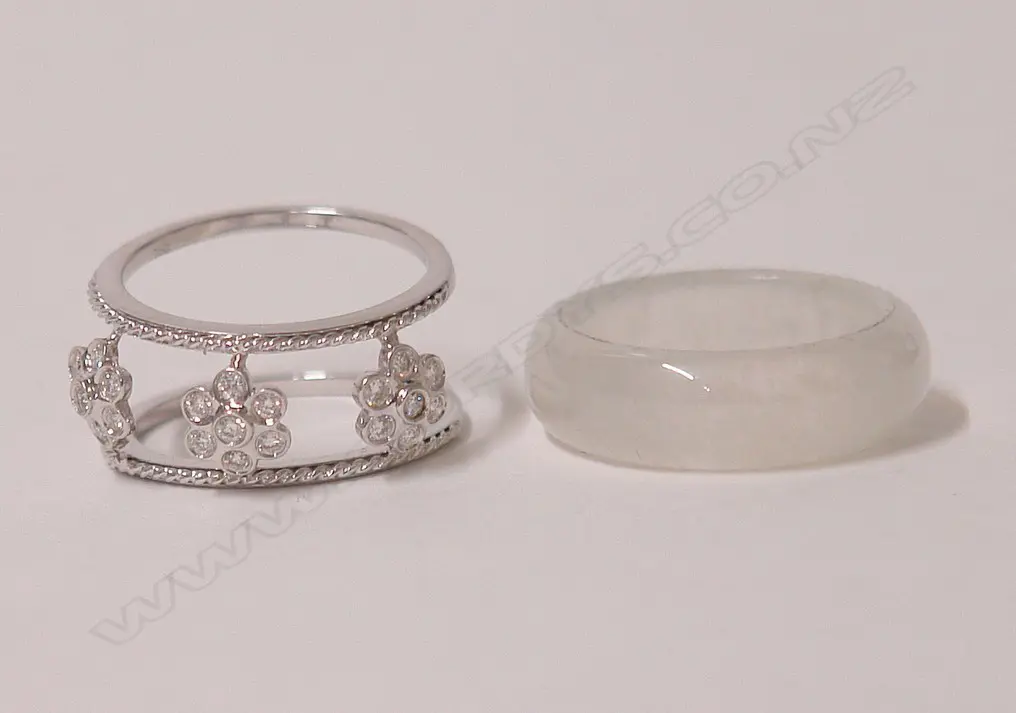 A lady's modern 18ct. yellow gold diamond and jade dress ring Image 1++