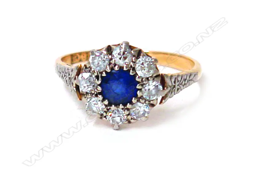A lady's estate 18ct. yellow gold sapphire and diamond cluster ring Image 1++