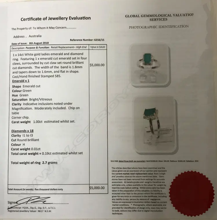 A 14ct. white gold emerald and diamond ring Image 1++