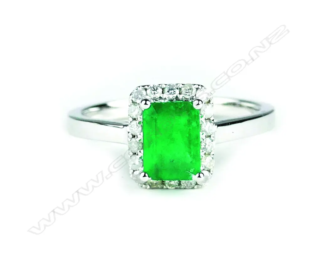A 14ct. white gold emerald and diamond ring Image 1++