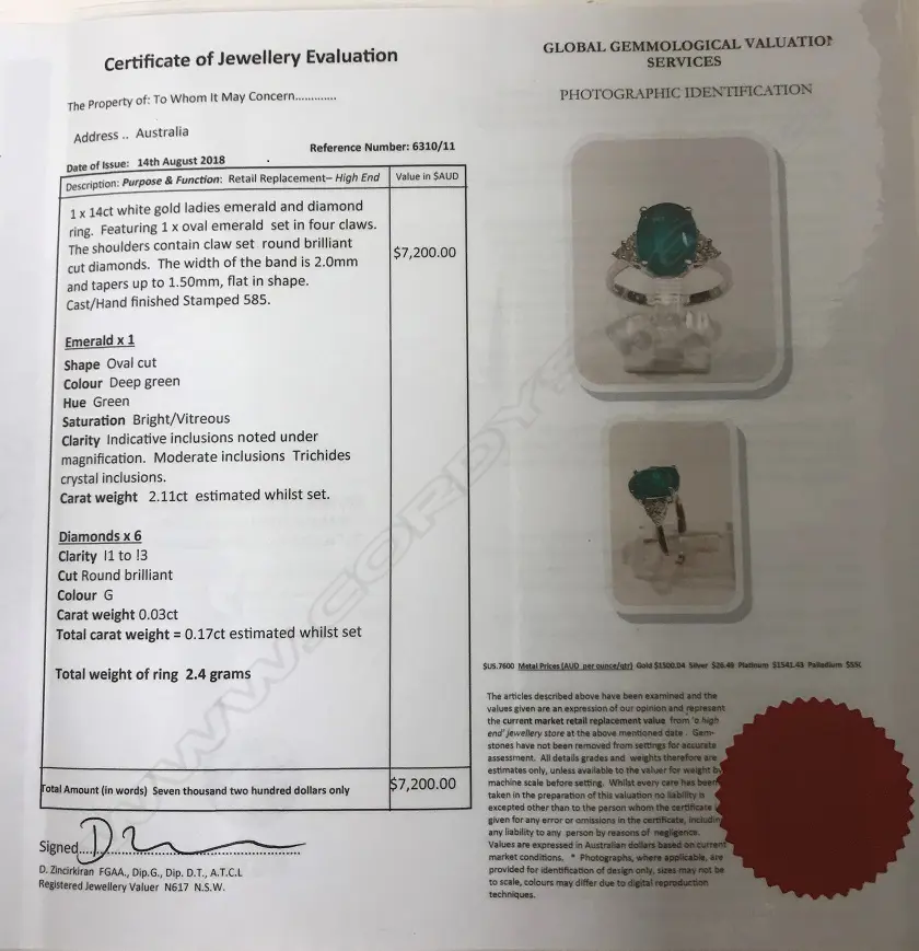 A 14ct. white gold emerald and diamond ring Image 1++