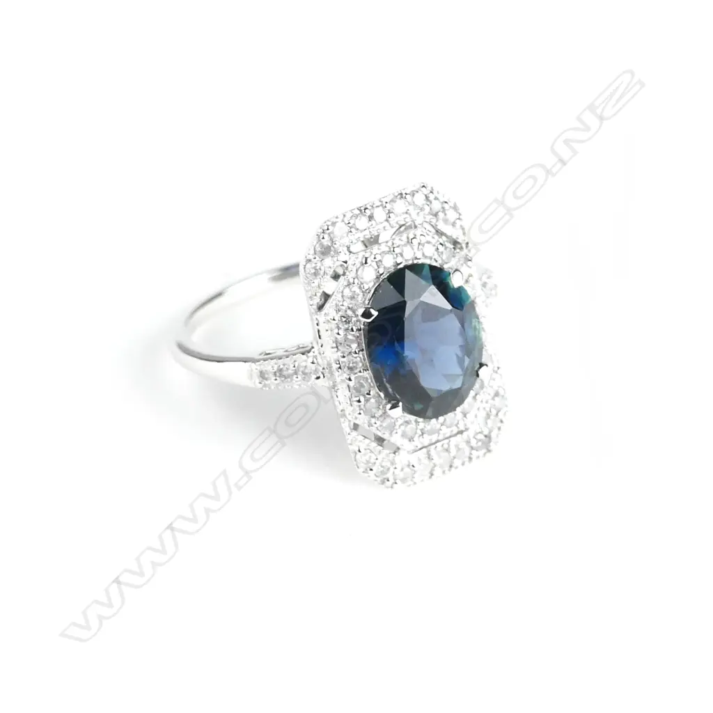 An 18ct. white gold sapphire and diamond Art Deco style ring Image 1++
