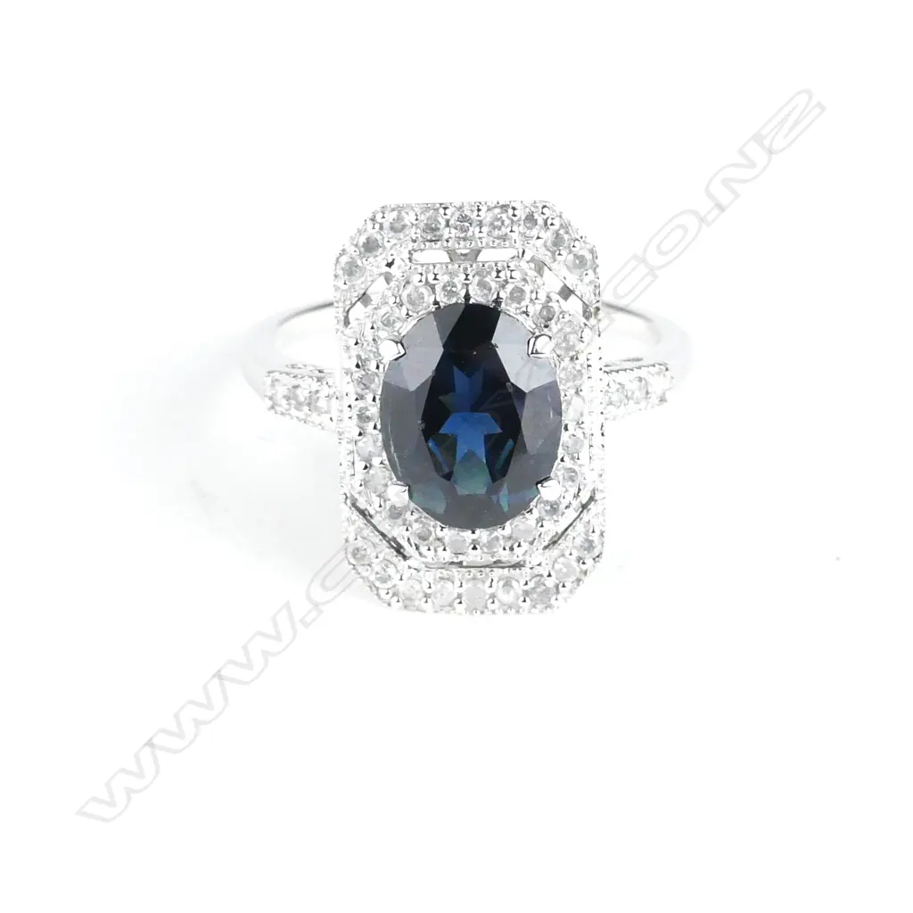 An 18ct. white gold sapphire and diamond Art Deco style ring Image 1++