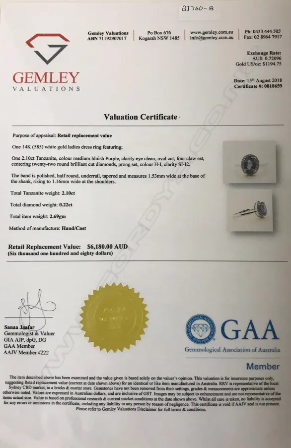 A 14ct. white gold tanzanite and diamond ring Image 1++