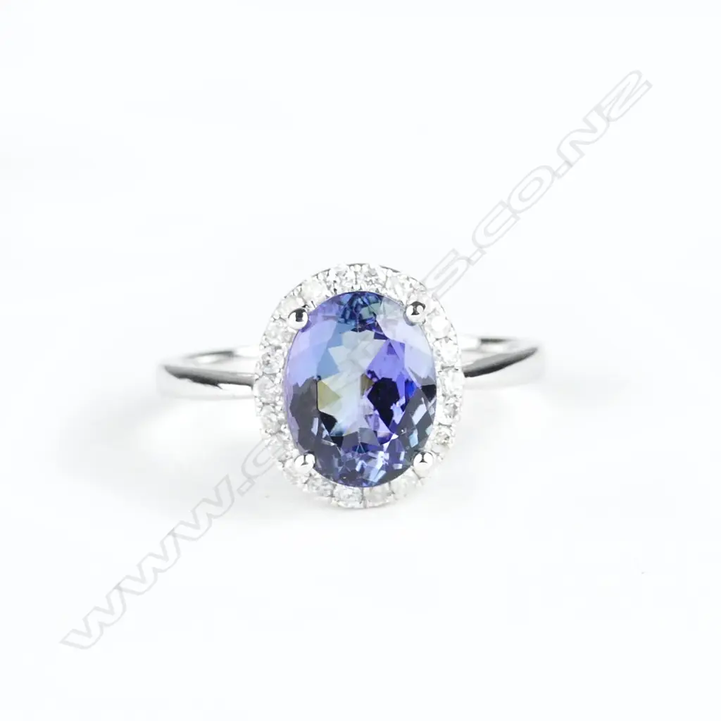 A 14ct. white gold tanzanite and diamond ring Image 1++