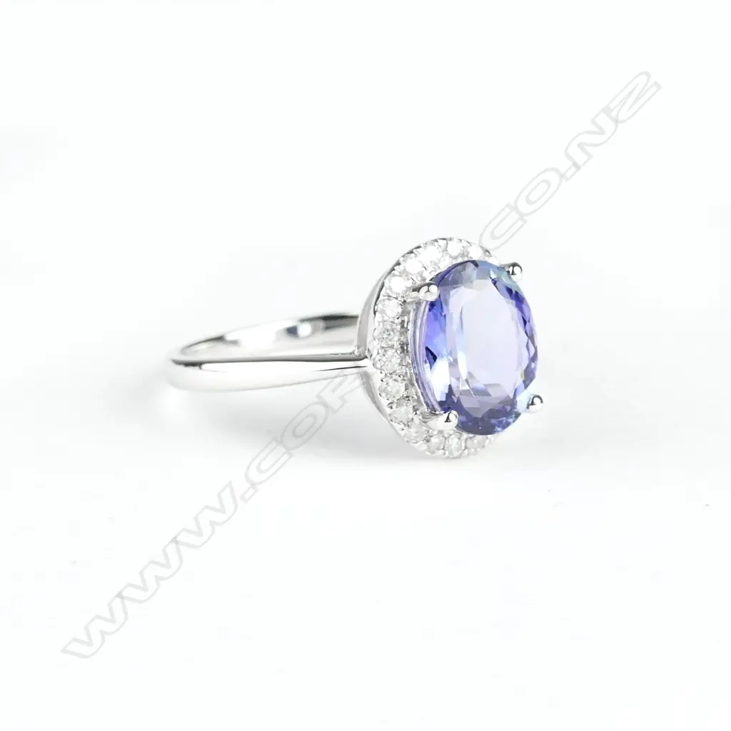 A 14ct. white gold tanzanite and diamond ring Image 1++