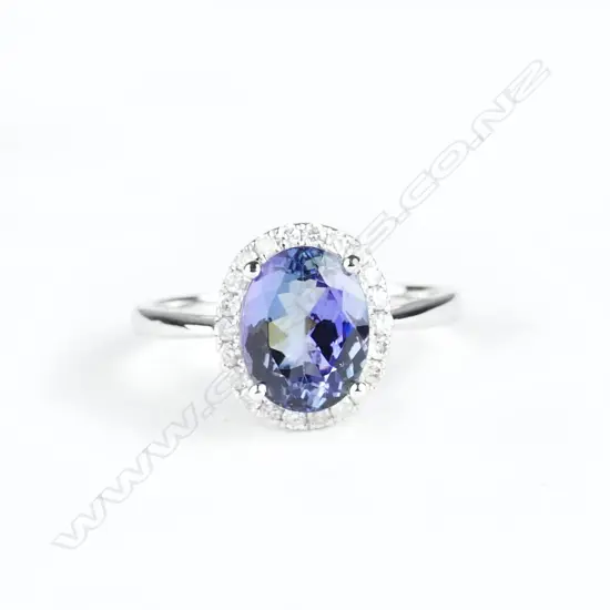A 14ct. white gold tanzanite and diamond ring