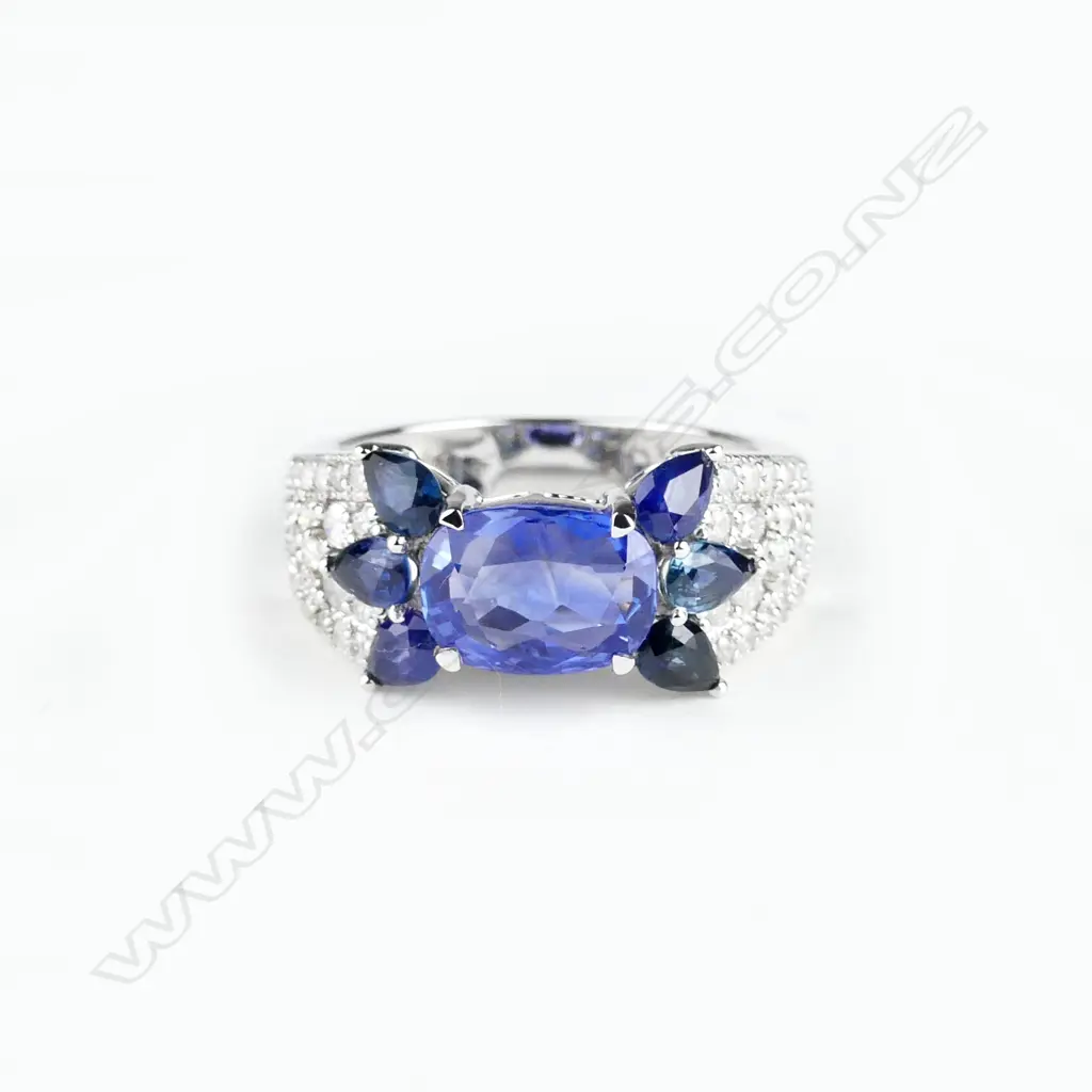 An 18ct. white gold sapphire and diamond ring Image 1++