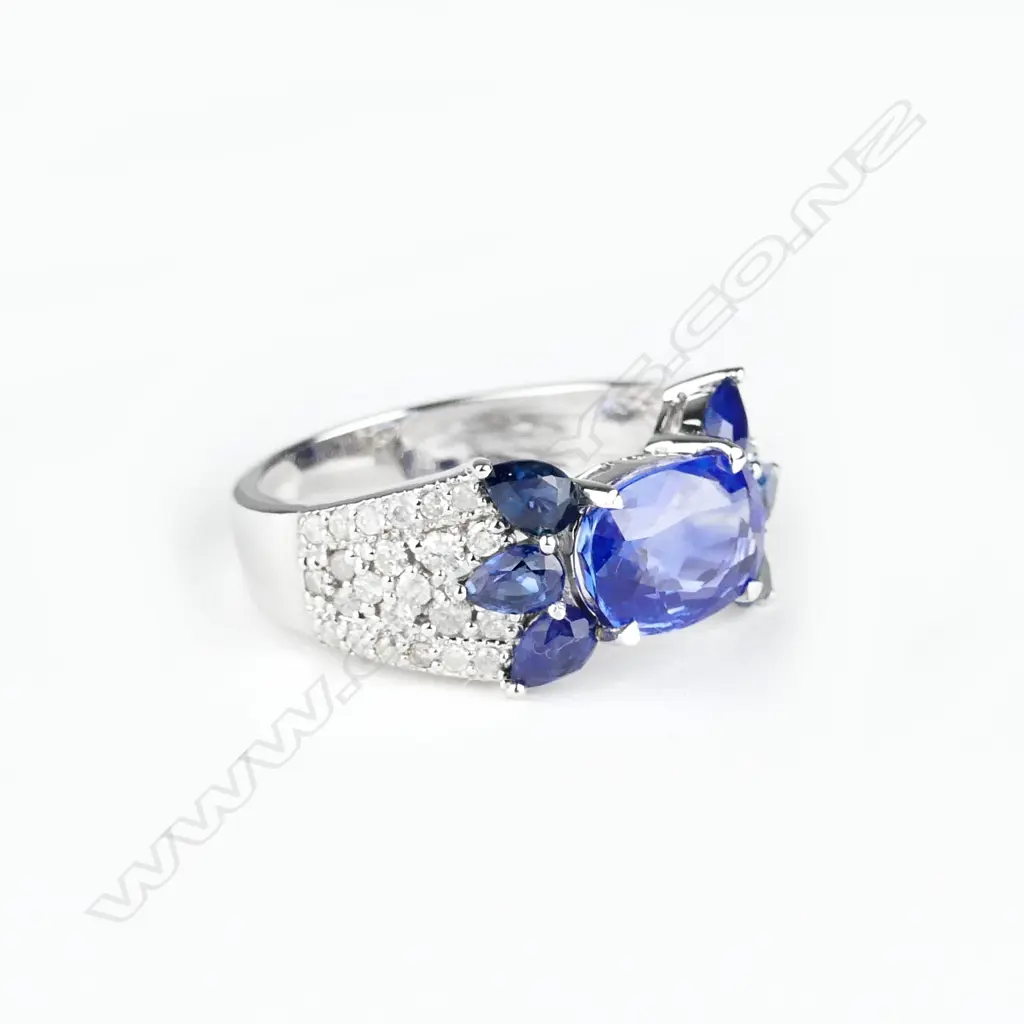 An 18ct. white gold sapphire and diamond ring Image 1++