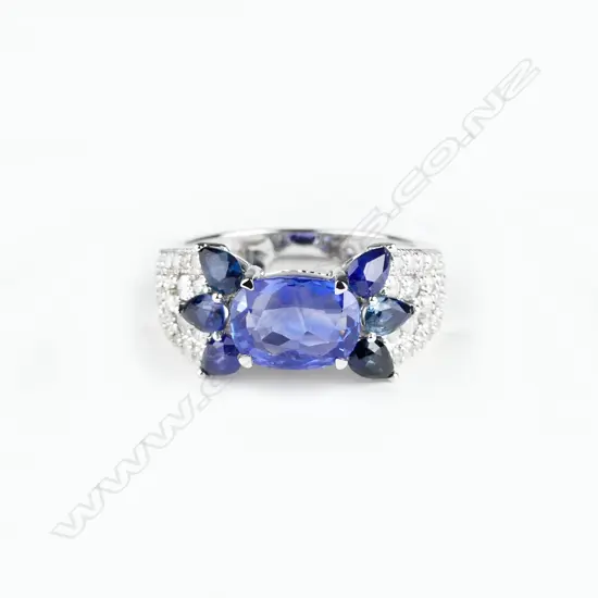 An 18ct. white gold sapphire and diamond ring