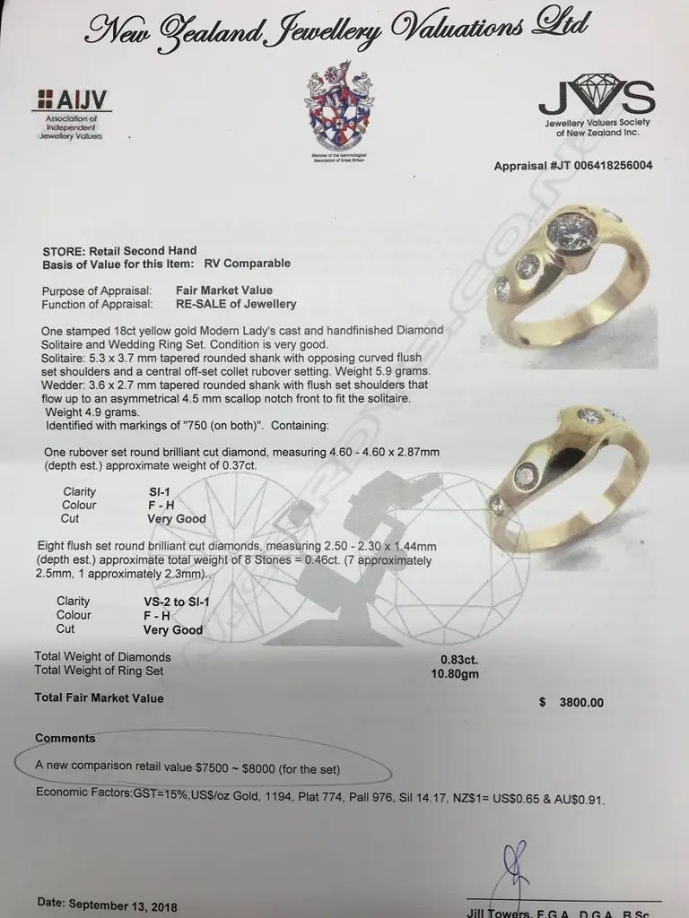 An 18ct. yellow gold and diamond solitaire and wedding ring set Image 1++